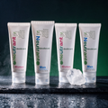 Neutrant Family Pack — four tubes on wet slate with a raw alum crystal