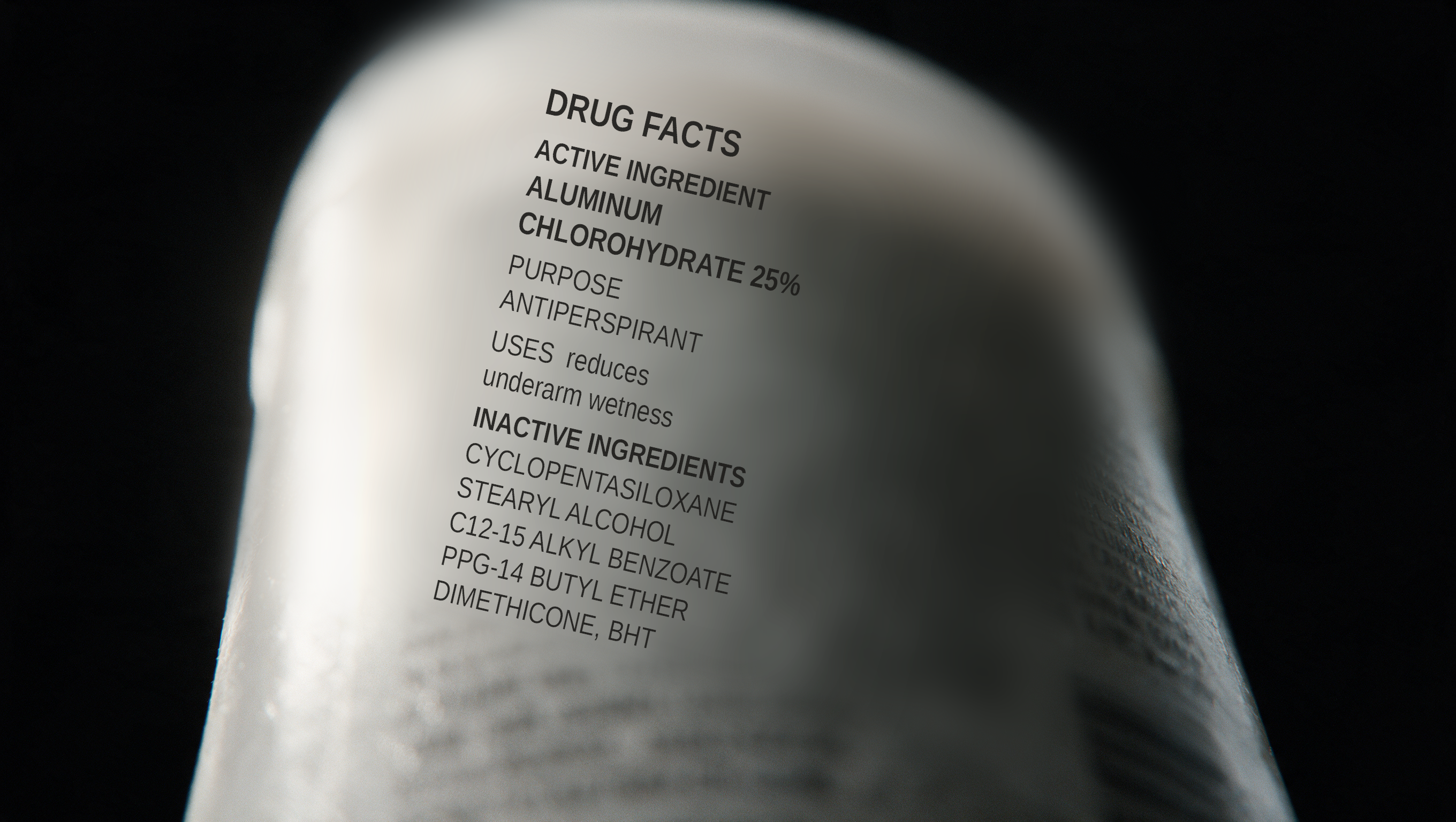 Macro of the ingredient list printed on a deodorant, out of focus